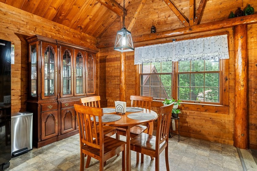 Rustic charm meets modern comfort in this beautiful log home - photo 5