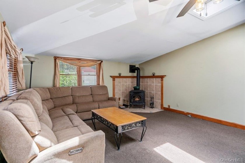 Set on a level, fully fenced property in East Islip, this 3 - photo 14