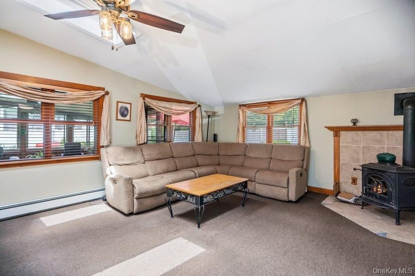 Set on a level, fully fenced property in East Islip, this 3 - photo 15