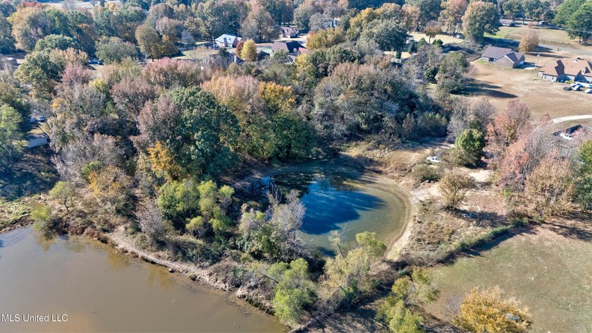 ***PRICE IMPROVEMENT***Discover your private oasis on this - photo 4