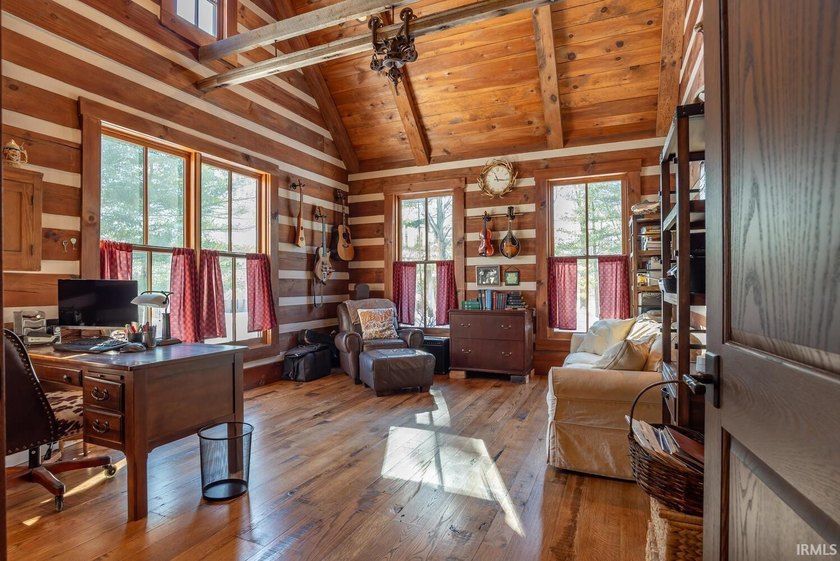 This one-of-a-kind custom log home, built in 2015, blends luxury - photo 22