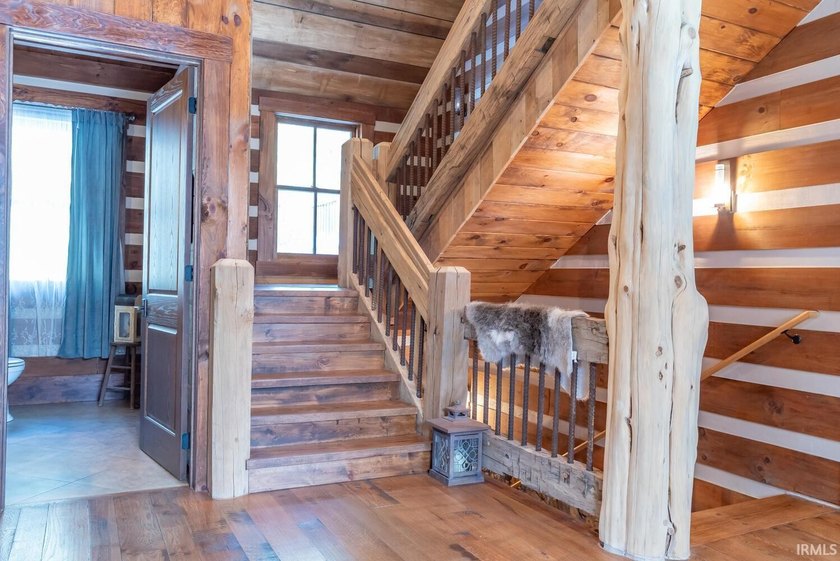 This one-of-a-kind custom log home, built in 2015, blends luxury - photo 25