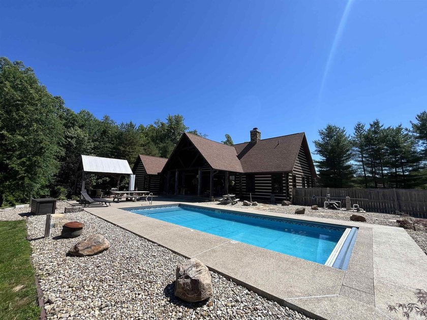 This one-of-a-kind custom log home, built in 2015, blends luxury - photo 44