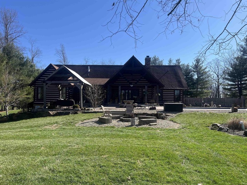 This one-of-a-kind custom log home, built in 2015, blends luxury - photo 49