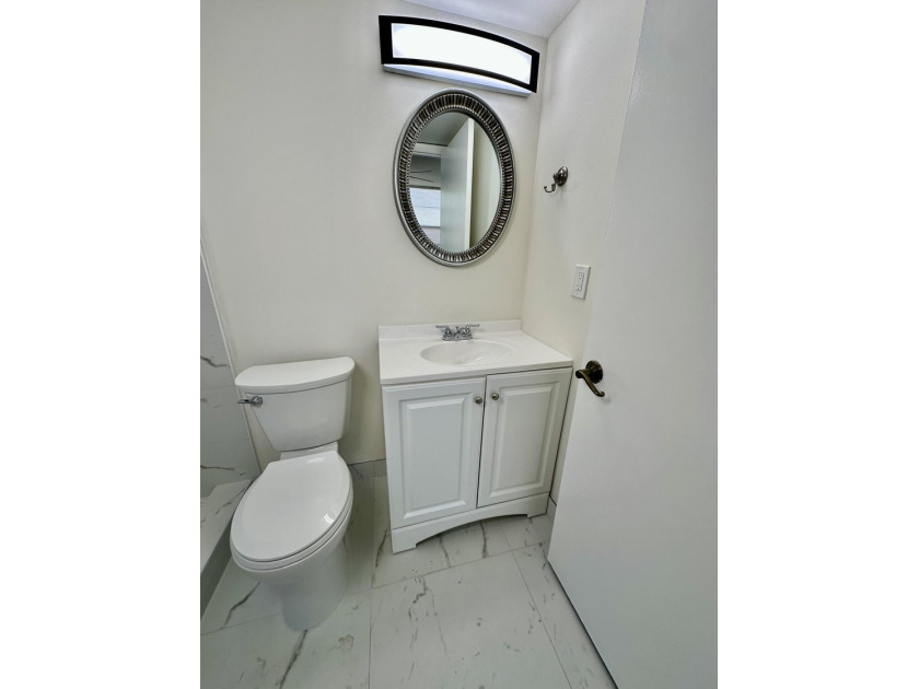 Fully Remodeled 2/2 Corner Unit in Margate! Step into this - photo 15