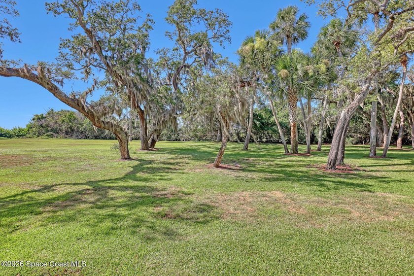 RIVERFRONT LIVING AT ITS FINEST! This stunning ground floor - photo 38