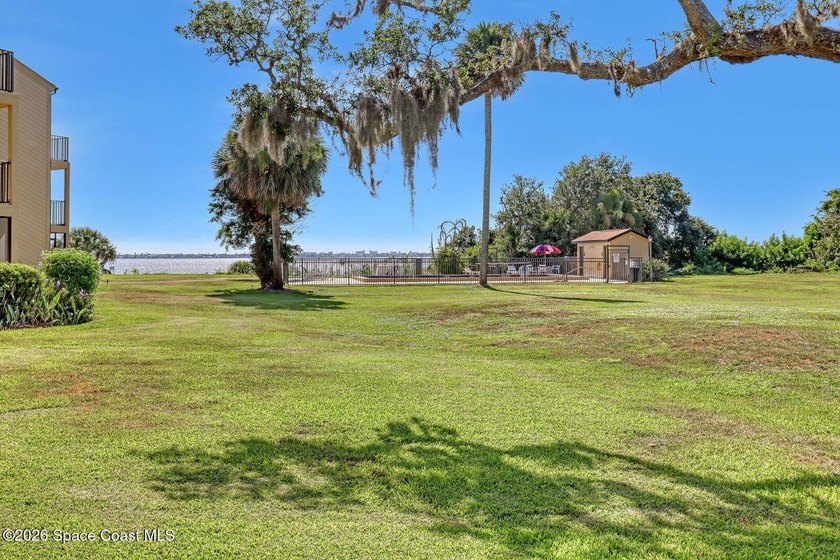RIVERFRONT LIVING AT ITS FINEST! This stunning ground floor - photo 39
