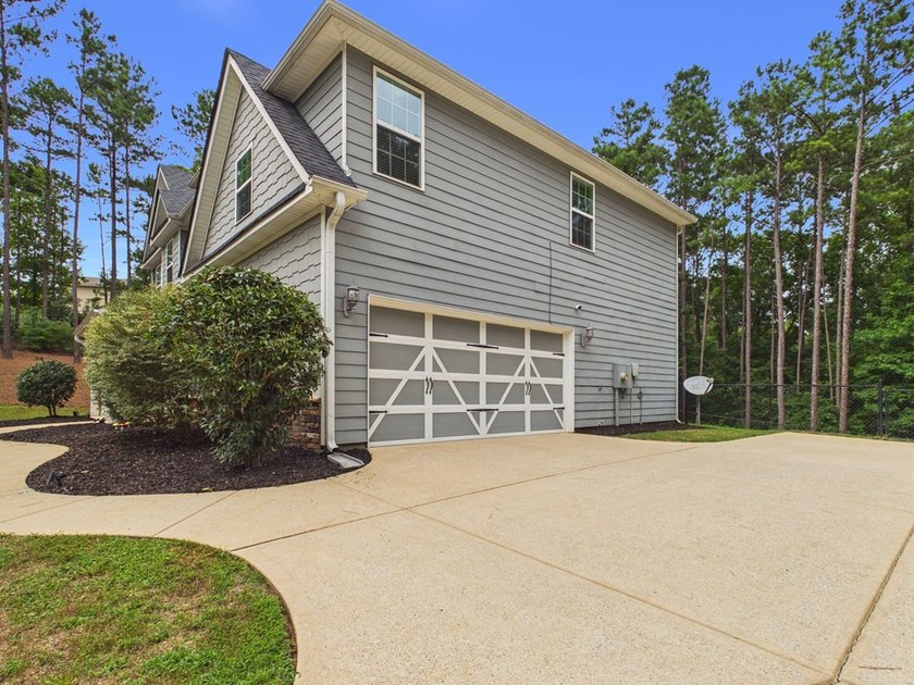 Set on over two private, wooded acres, this beautifully updated - photo 5