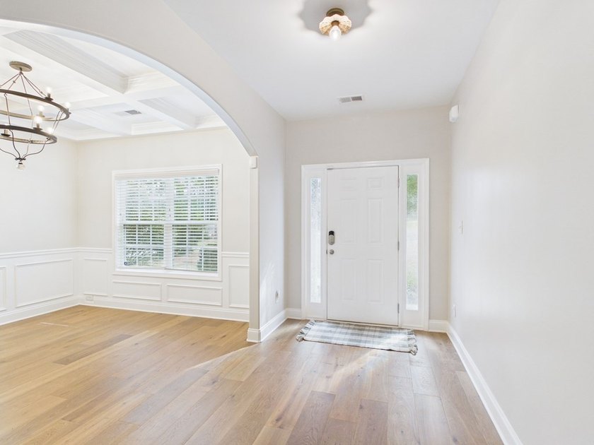 Set on over two private, wooded acres, this beautifully updated - photo 8