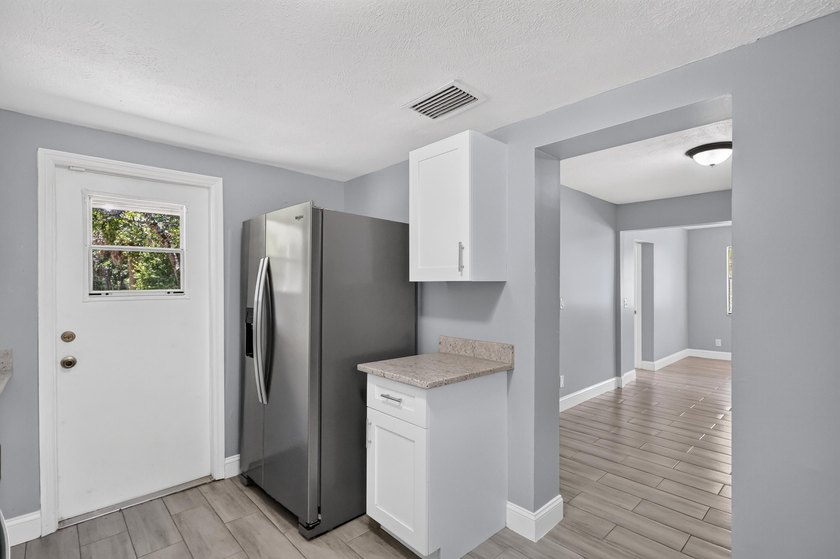 Nicely renovated 3-bedroom, 2-bath CBS home situated on a - photo 17