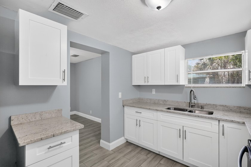 Nicely renovated 3-bedroom, 2-bath CBS home situated on a - photo 19