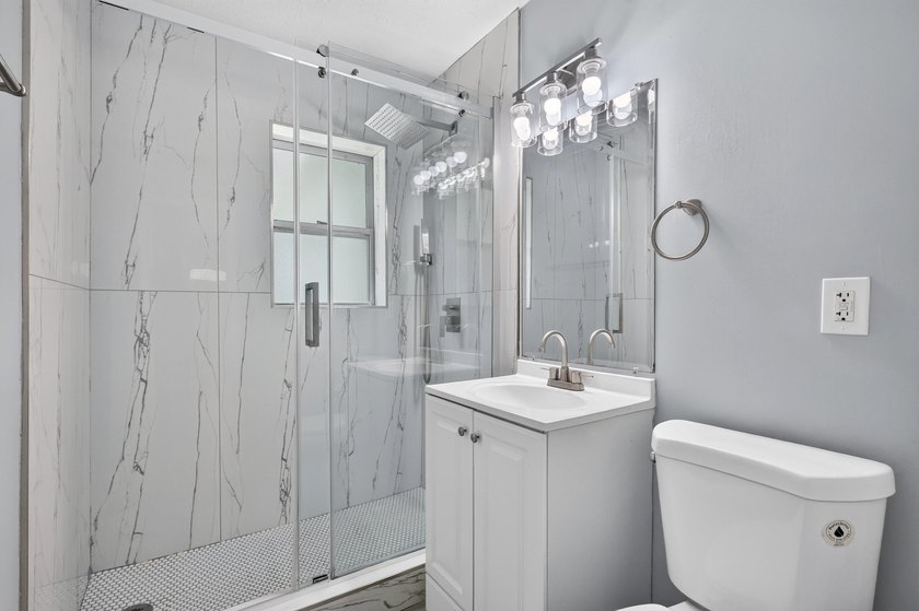 Nicely renovated 3-bedroom, 2-bath CBS home situated on a - photo 30