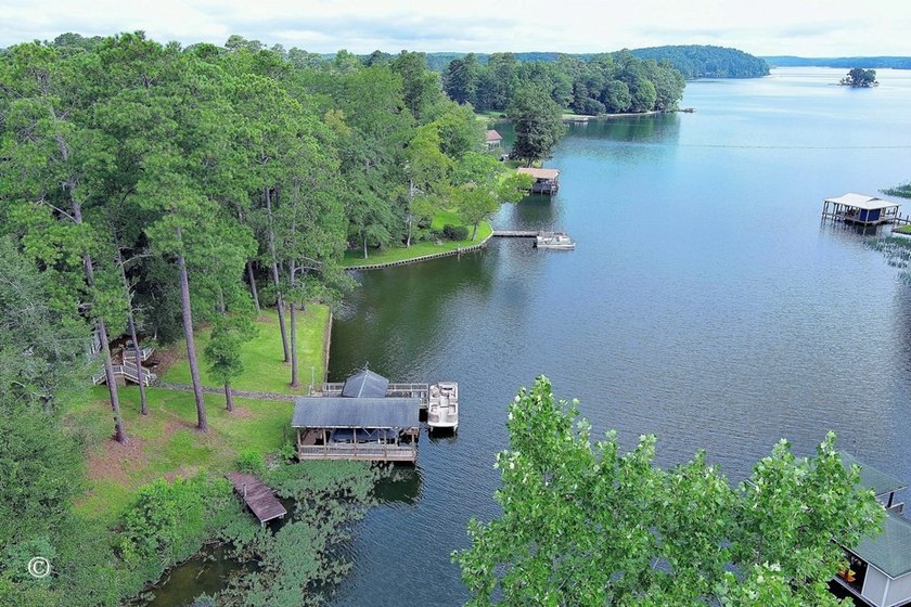 Wake up to breathtaking long-range views of Lake Harding from - photo 4