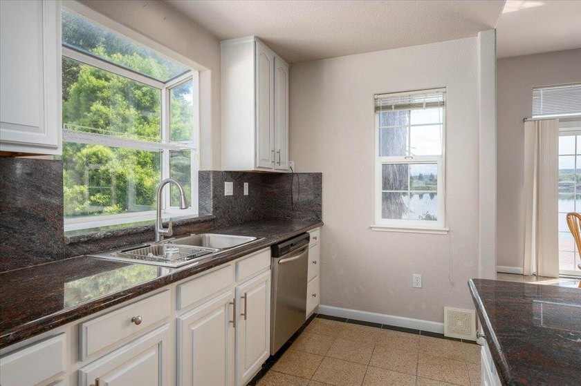 Beautiful Lakefront Living with 150 Feet of Waterfront and Views - photo 13