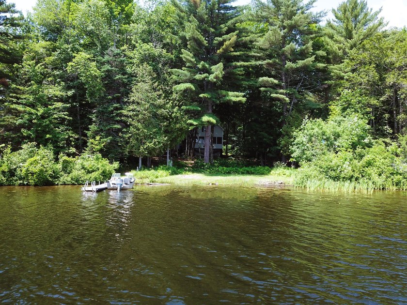 Just minutes from town yet privately tucked among the woods - photo 36