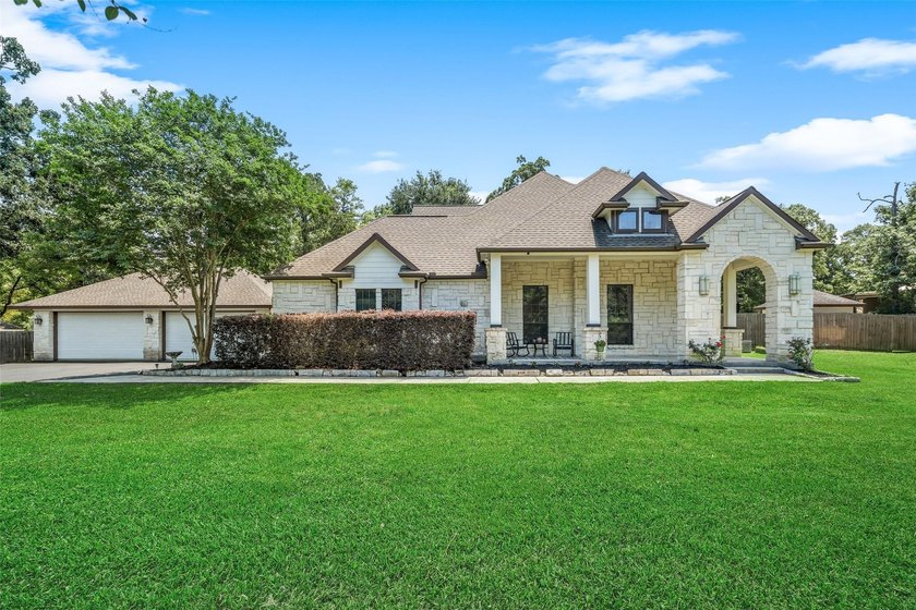 Stunning Country style stone home nestled on 1.5 acres with the - photo 4