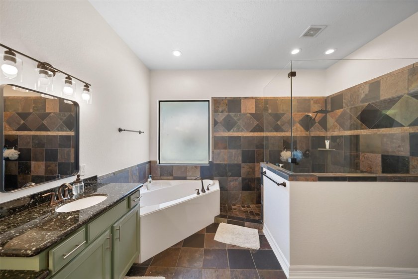 Stunning Country style stone home nestled on 1.5 acres with the - photo 9