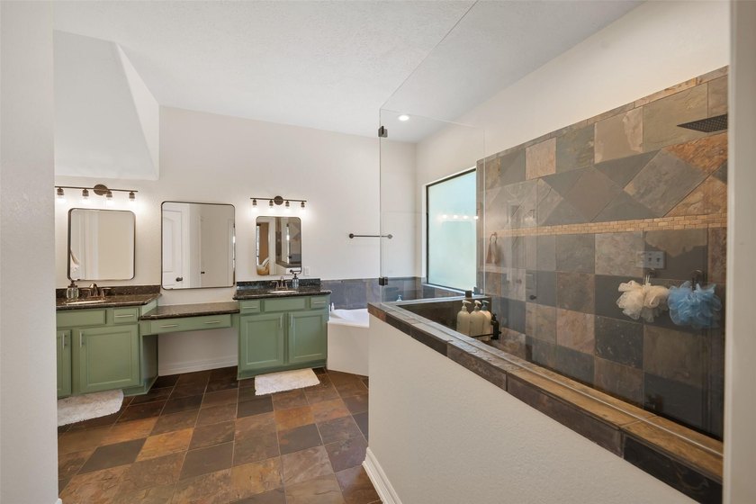 Stunning Country style stone home nestled on 1.5 acres with the - photo 10