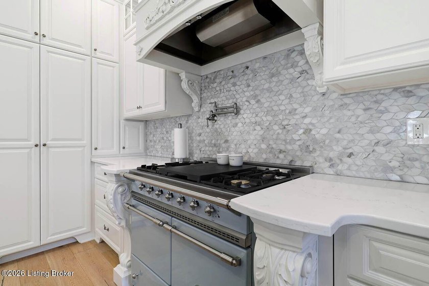 Discover this exceptional custom French-inspired estate on 8.3 - photo 24