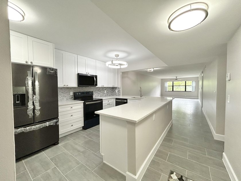Completely and Beautifully renovated with open floor plan - photo 12