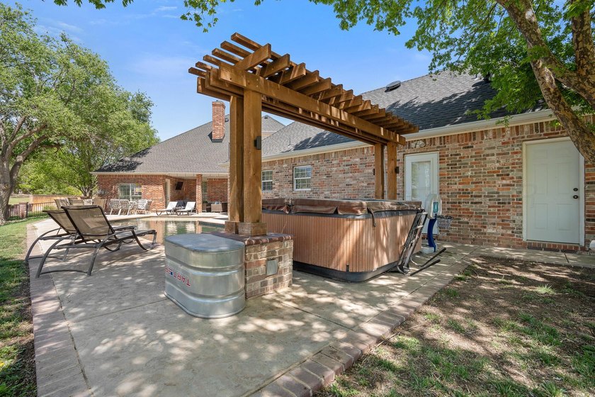 This stunning 4-bedroom, 4-bath home has exceptional views of - photo 47