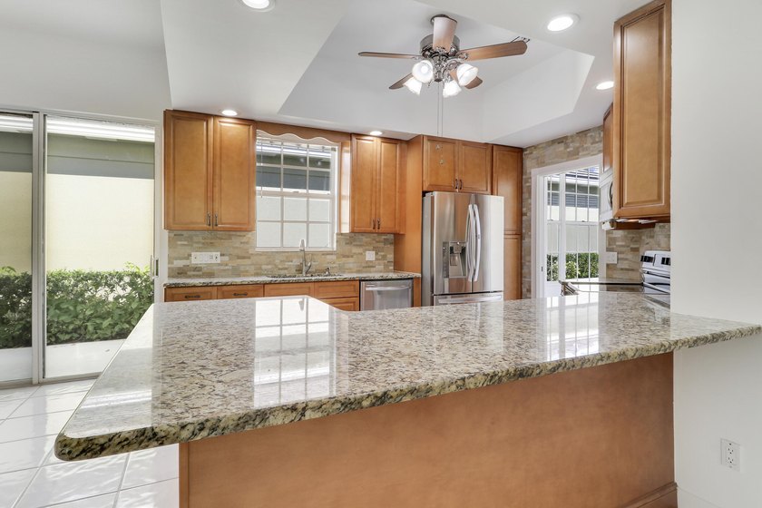 Light, bright, and move-in ready, this immaculate home offers a - photo 2