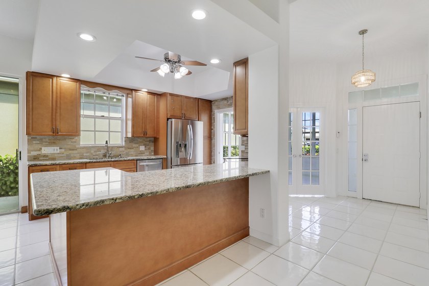 Light, bright, and move-in ready, this immaculate home offers a - photo 7