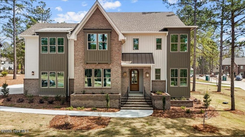 This grand home offers an impressive layout filled with style - photo 2