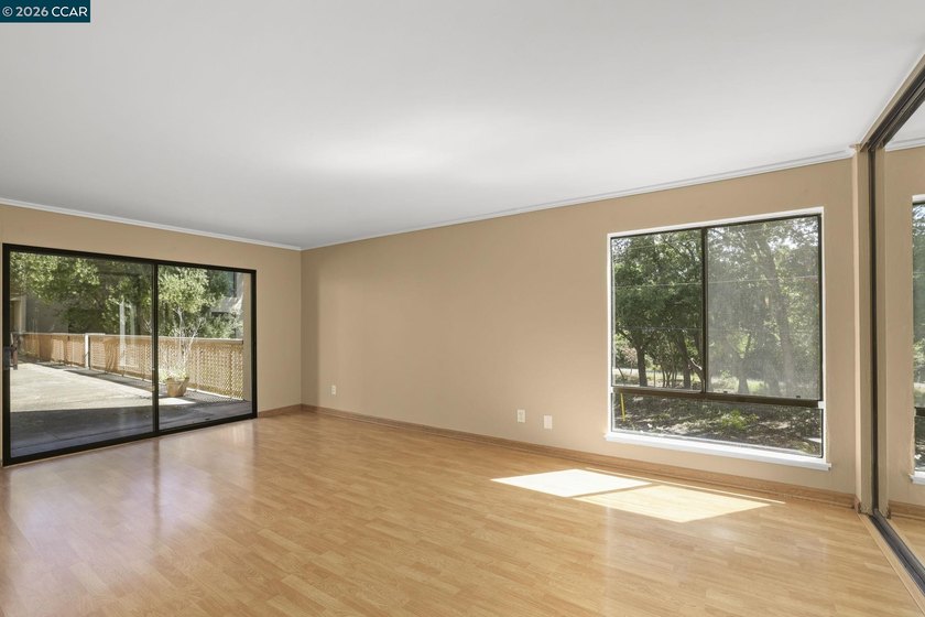 Step inside to an open, light-filled floor plan thoughtfully - photo 4