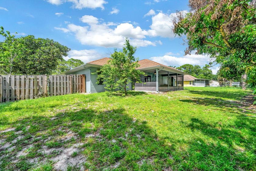 Welcome to this charming 3/2/2 home located on an oversized - photo 4