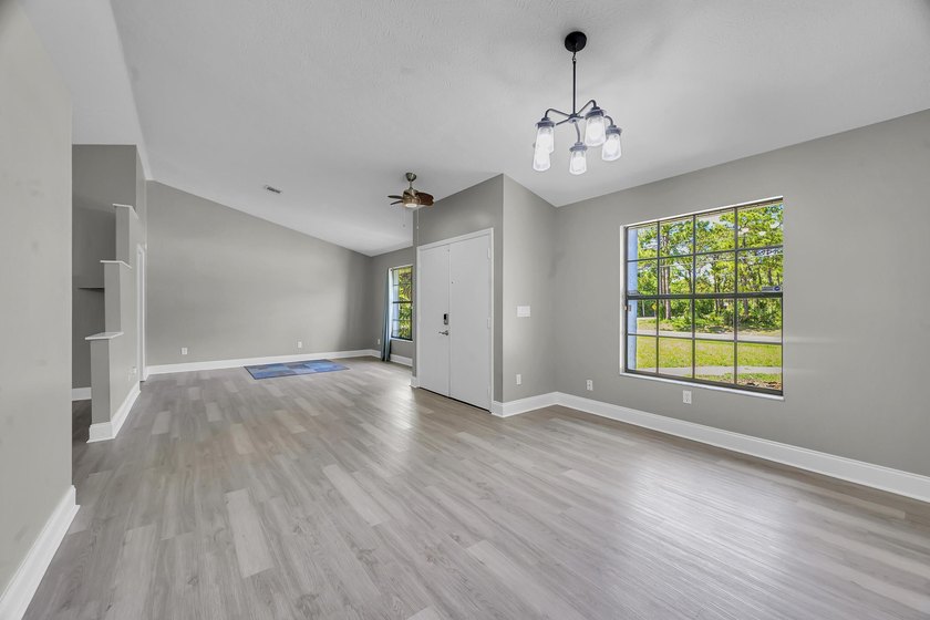 Welcome to this charming 3/2/2 home located on an oversized - photo 8