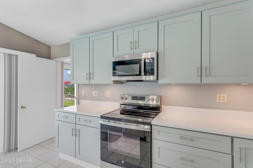 This riverfront home, which has great potential as an  nestled - photo 12