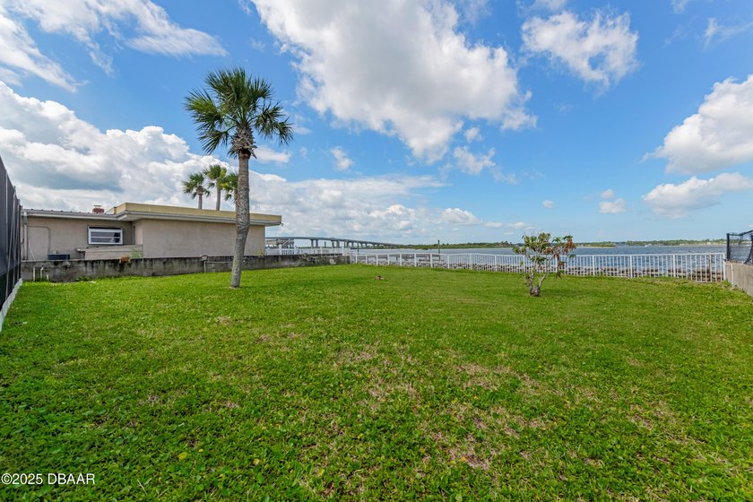 This riverfront home, which has great potential as an  nestled - photo 31