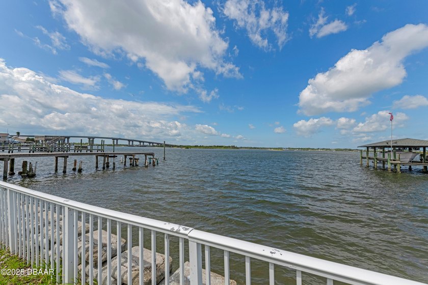 This riverfront home, which has great potential as an  nestled - photo 32