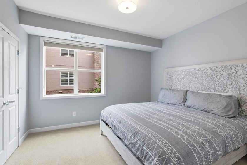 Experience sophisticated, low-maintenance living at **Wooddale - photo 12