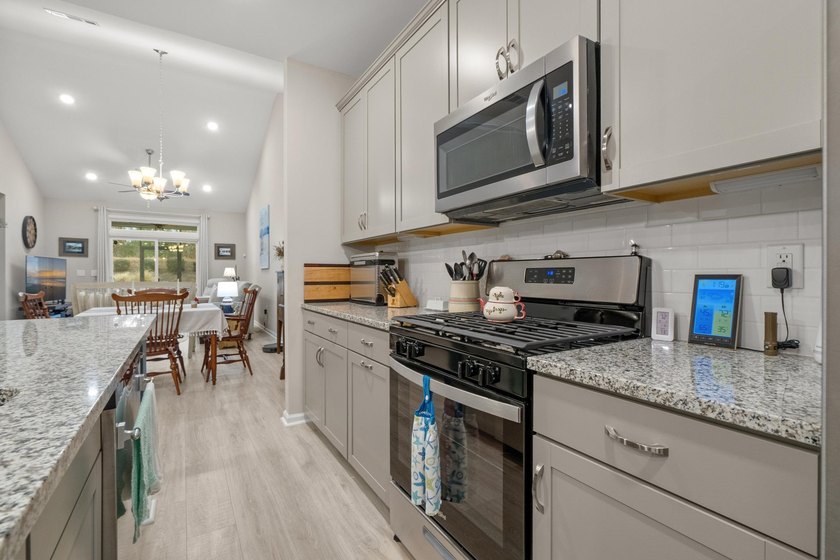 Welcome to the sought-after Garden Homes at Bella Vita, where - photo 13