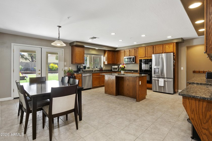 This five-bedroom, four bath home located in the sought-after - photo 7