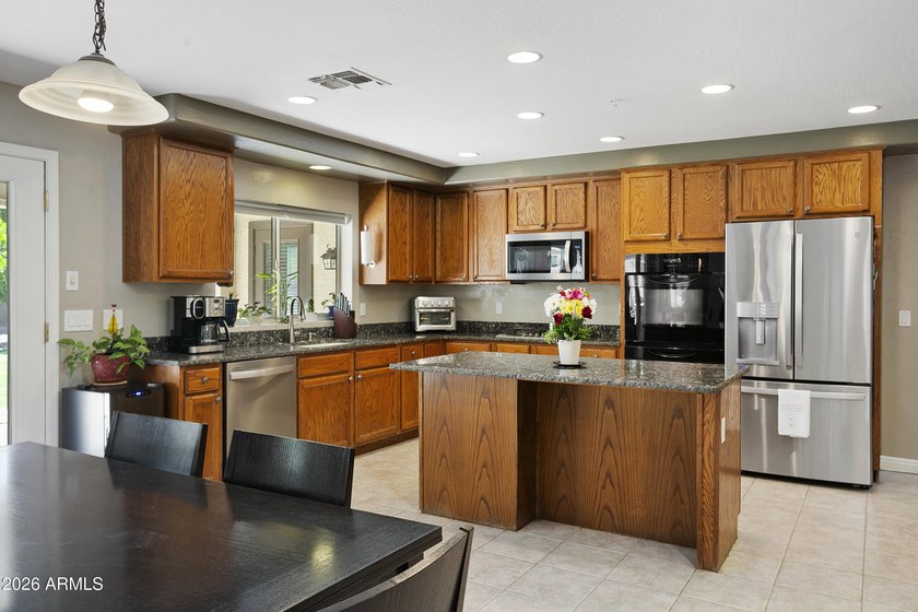 This five-bedroom, four bath home located in the sought-after - photo 8