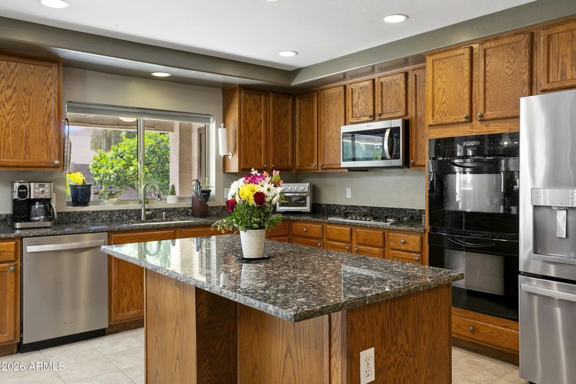 This five-bedroom, four bath home located in the sought-after - photo 9