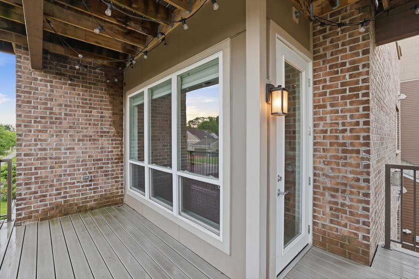 Experience sophisticated, low-maintenance living at **Wooddale - photo 21