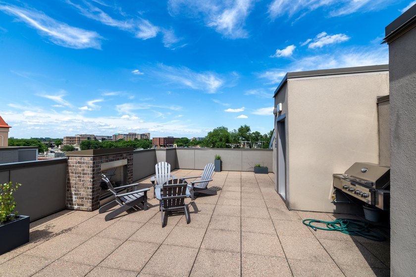 Experience sophisticated, low-maintenance living at **Wooddale - photo 28