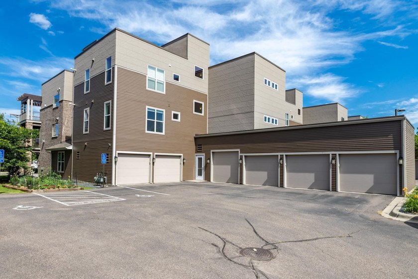 Experience sophisticated, low-maintenance living at **Wooddale - photo 32