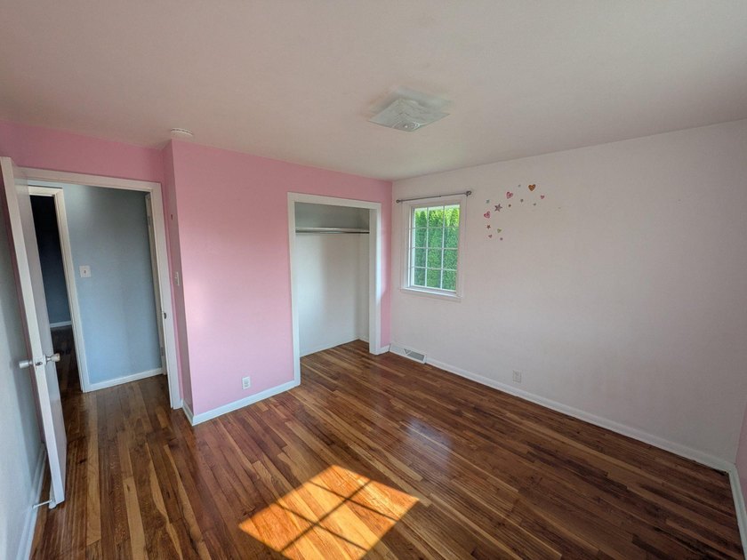 This charming split-level home, built in 1960, offers a perfect - photo 32