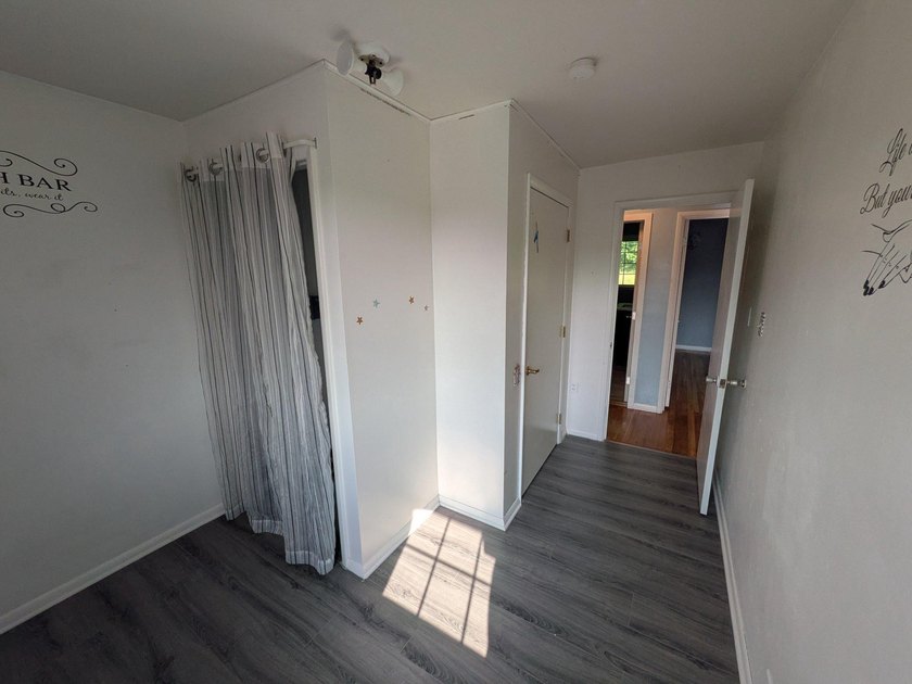 This charming split-level home, built in 1960, offers a perfect - photo 33