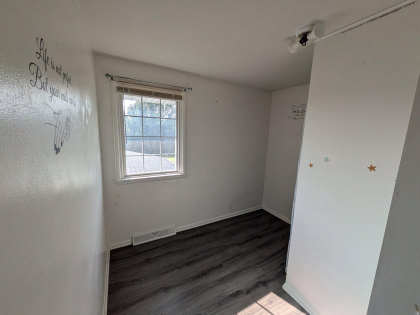 This charming split-level home, built in 1960, offers a perfect - photo 34