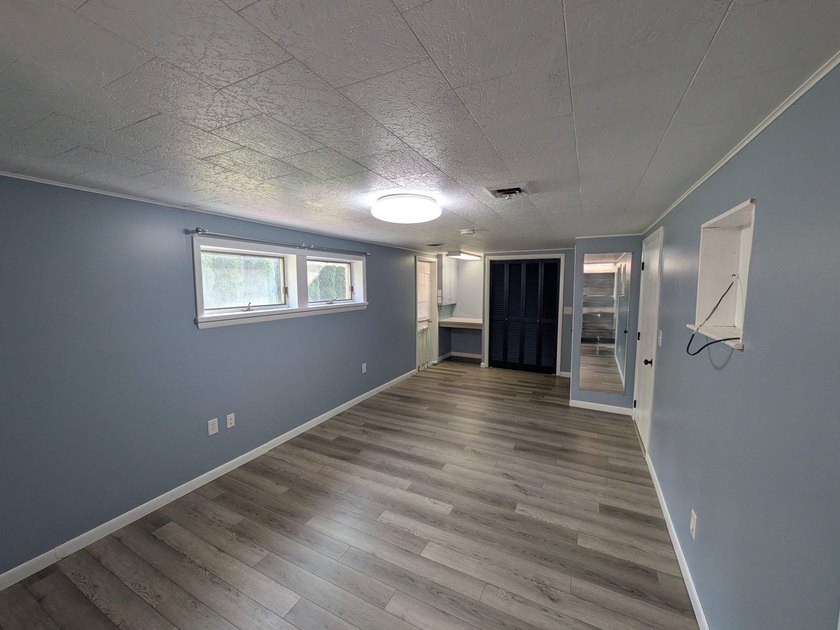 This charming split-level home, built in 1960, offers a perfect - photo 38