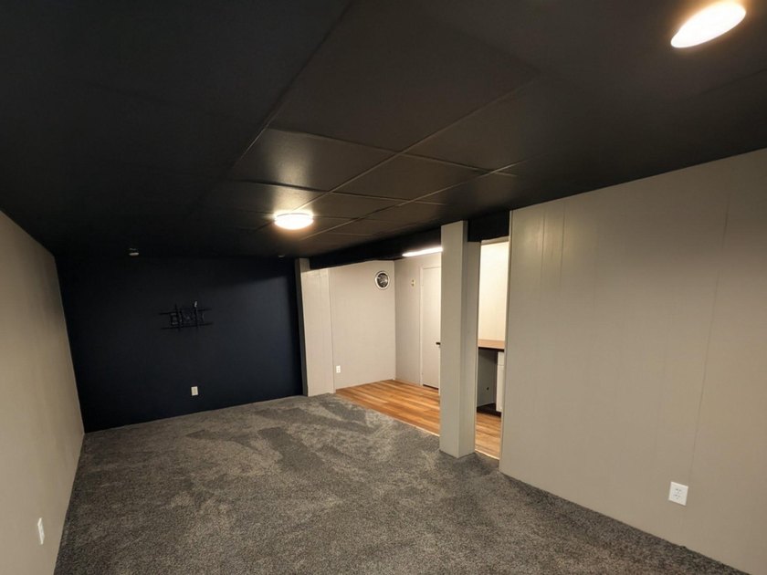 This charming split-level home, built in 1960, offers a perfect - photo 42