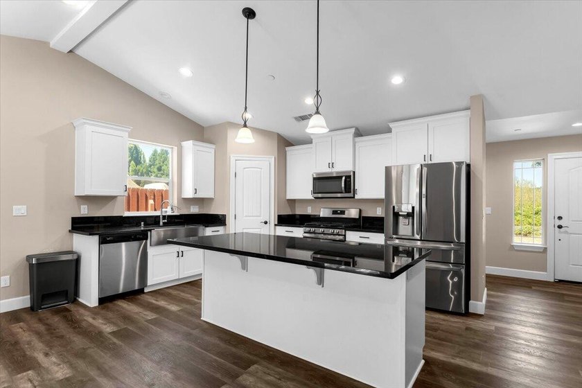 Built in 2021, this beautifully appointed home offers the - photo 12