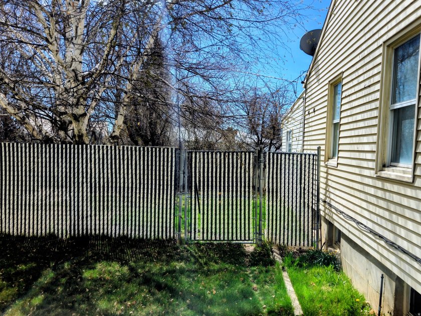 Take a look at this inviting 4-bedroom, 2-bathroom home tucked - photo 3