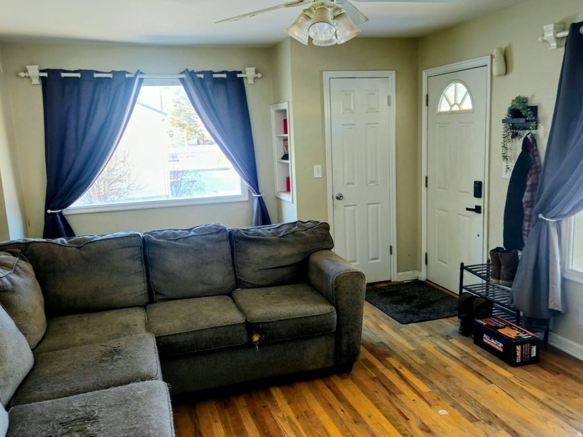 Take a look at this inviting 4-bedroom, 2-bathroom home tucked - photo 5